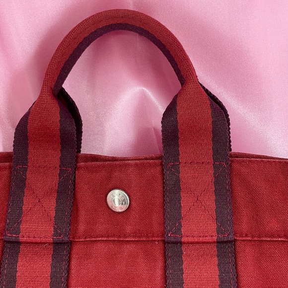 Hermès Fourre Tout PM tote bag in red canvas with black and red striped handles - Picture 4 of 15
